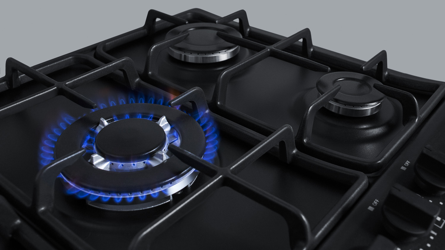 5-burner gas cooktop made in Italy in a black matte finish with sealed burners, cast iron grates, and wok stand; fits standard 24